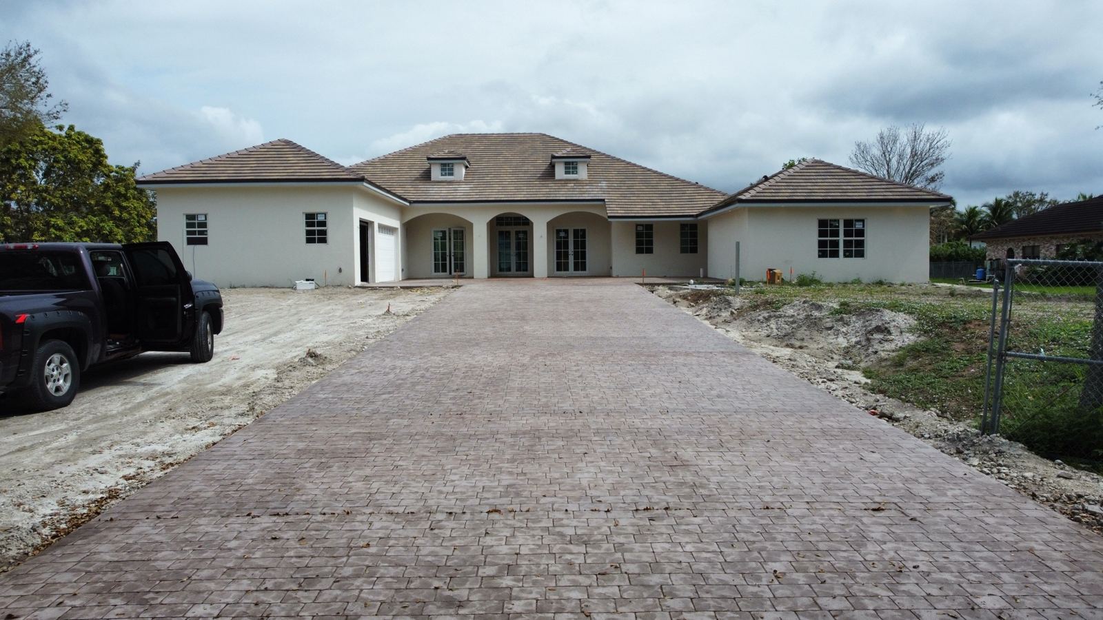 Long brick paver driveway by Concrete Solutions Today, serving Weston, FL